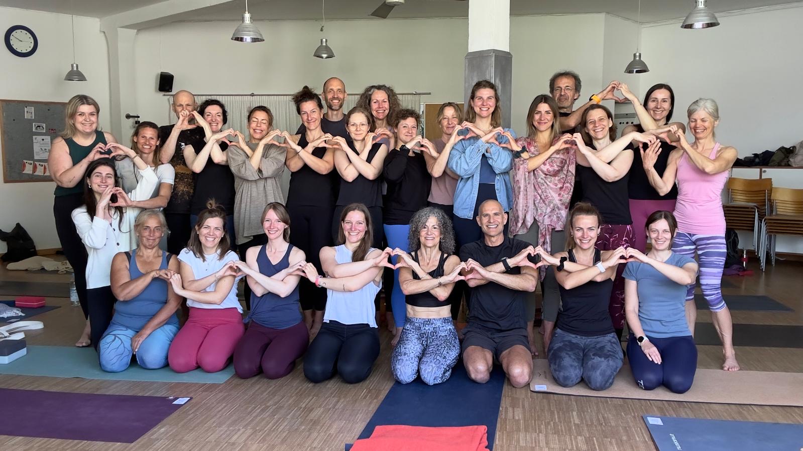 group photo of yoga students at a yoga workshop