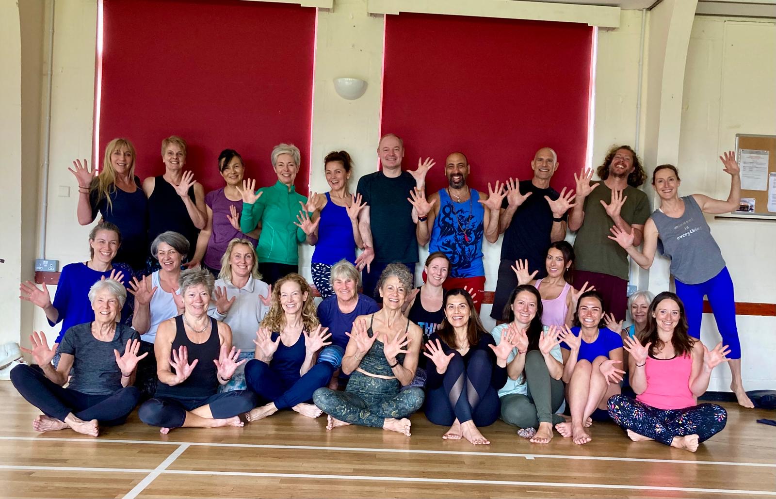 group photo of students at a yoga workshop