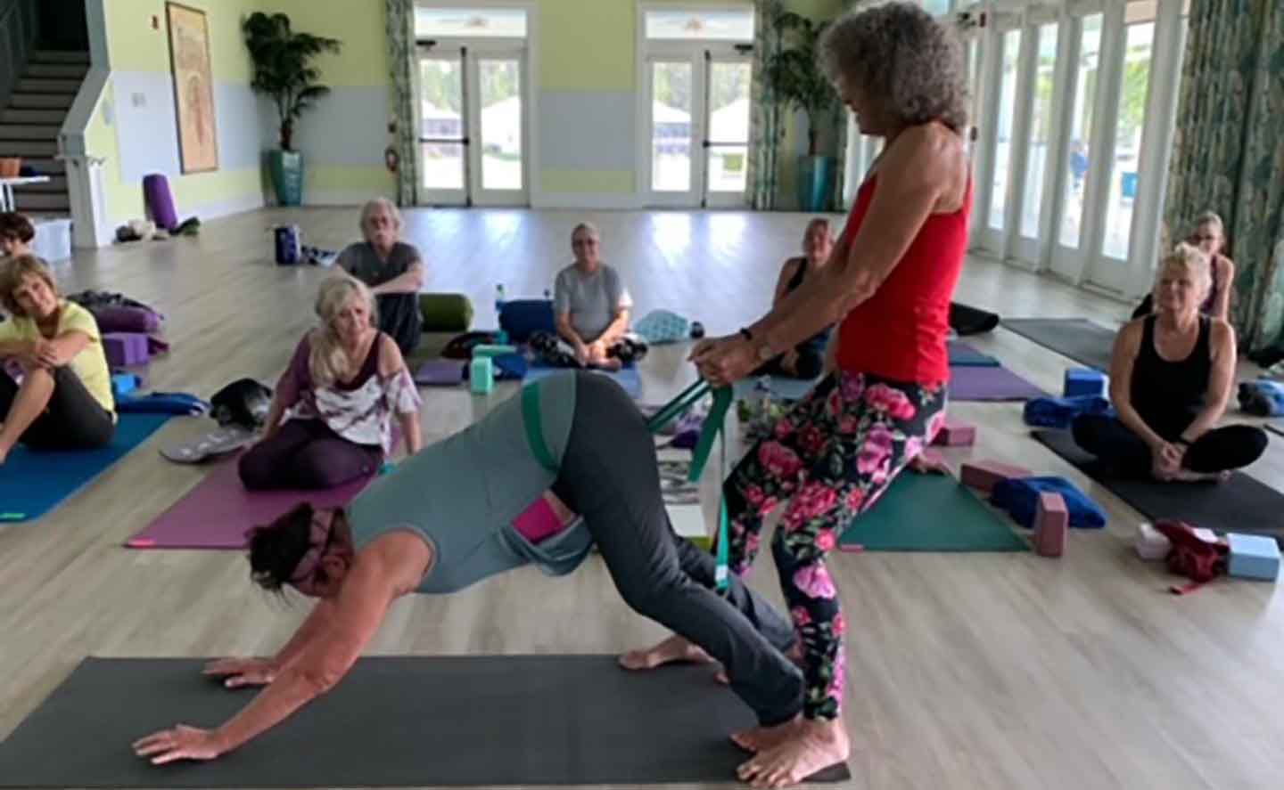 Desiree working with client at workshop