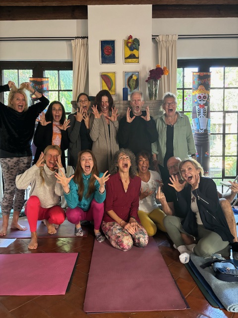 Dia De Los Muertos retreat photo showing all attendees posting for a picture