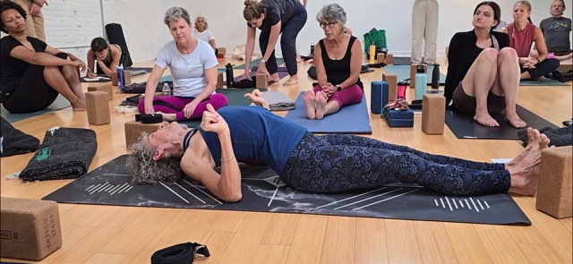 yoga students at a workshop